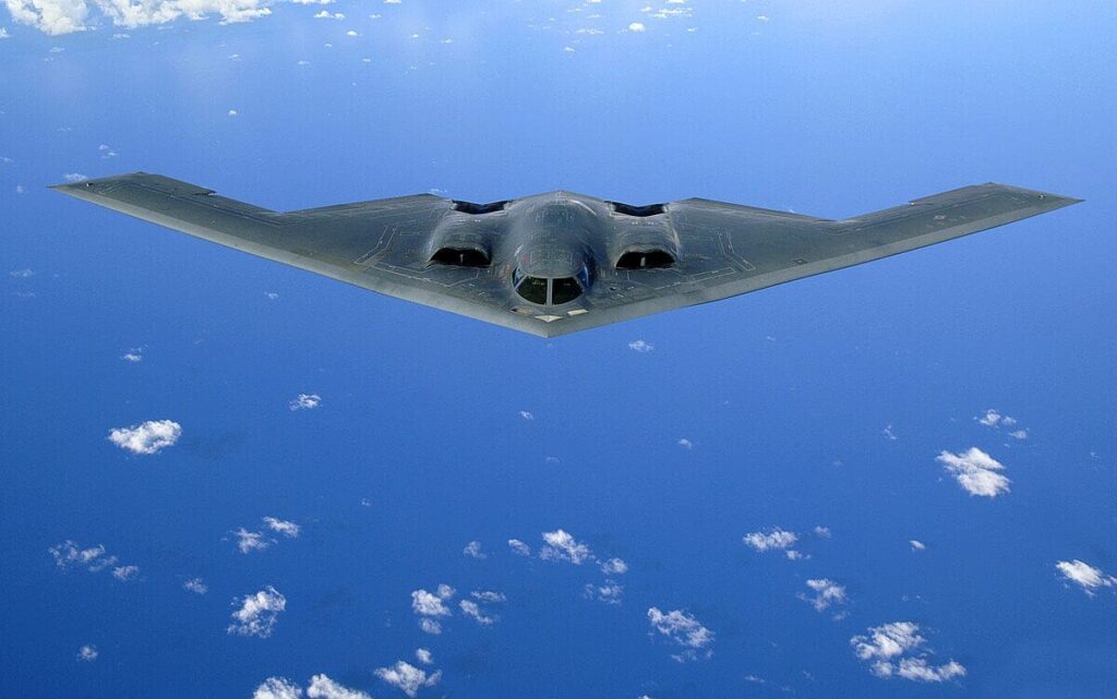 B-2 Spirit stealth bomber flying over ocean