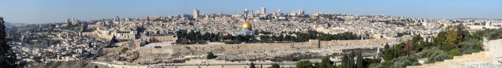 Panoramic view of Jerusalem cityscape with notable landmarks.